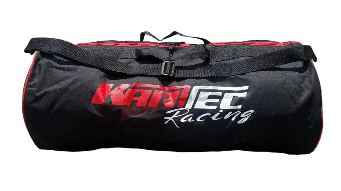 Schwarze kamtec racing karttec racing duffel reifentasche mit verstärkten griffen und rot weißen zipper details